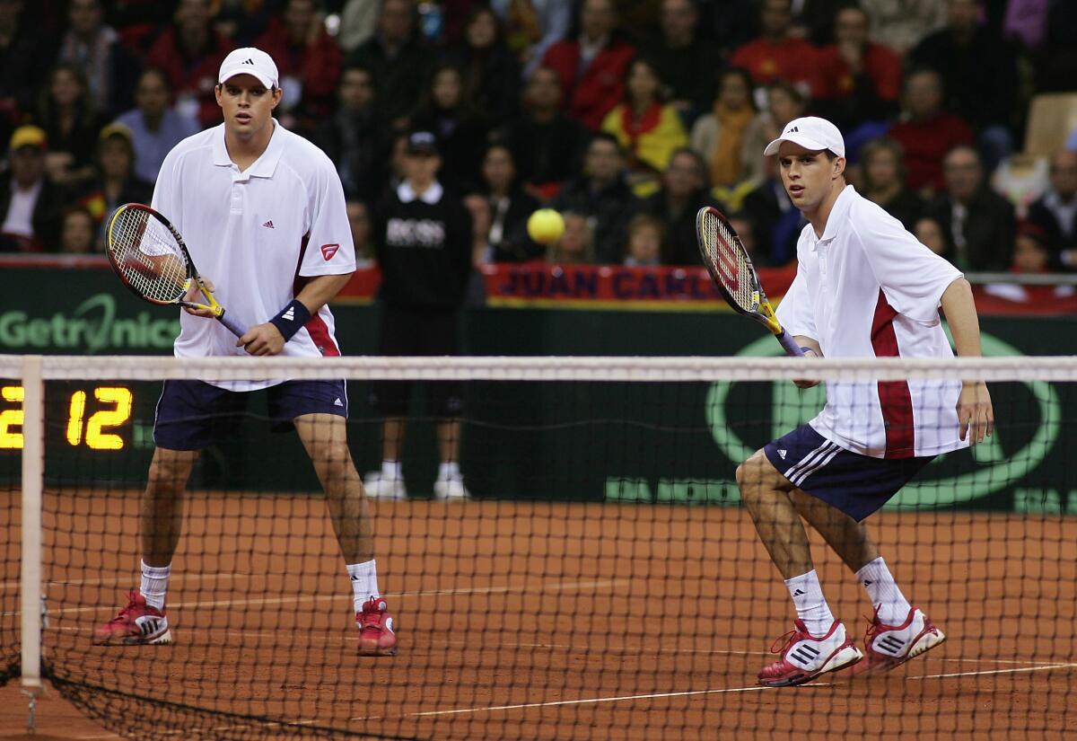 Bob, left, and Mike Bryan in the Davis Cup final in Seville, Spain, in December 2004.