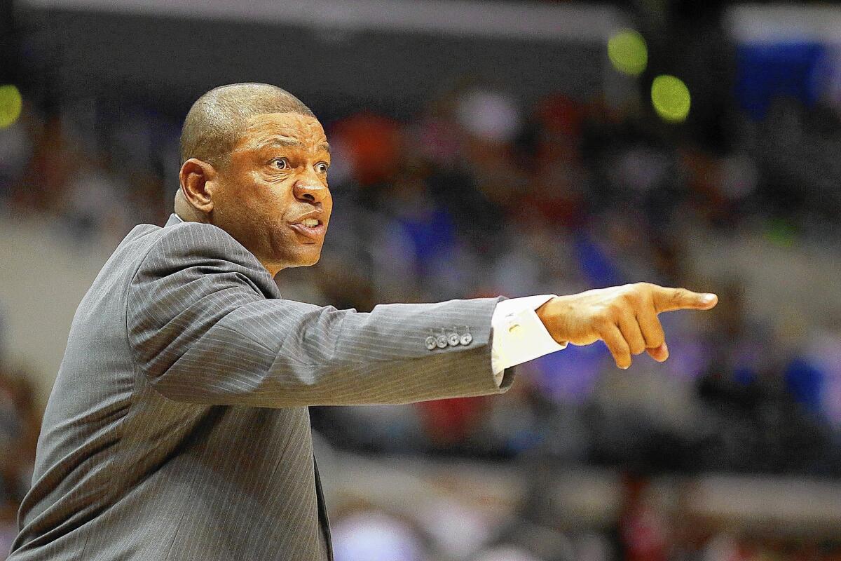 Clippers coach Doc Rivers has his team adopting an embrace-the-challenge attitude for the playoffs. “I just think, what’s wrong with going for it?” said Rivers.