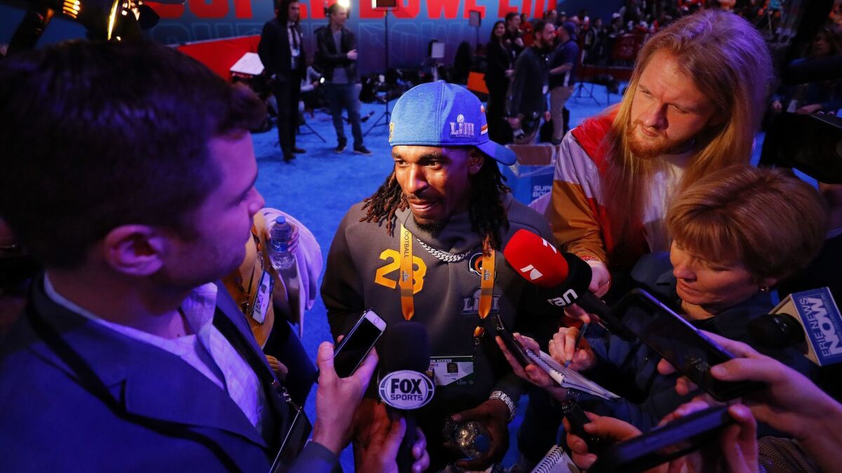 Rams cornerback Nickell Robey-Coleman answers questions at Super Bowl opening night in Atlanta on Monday.