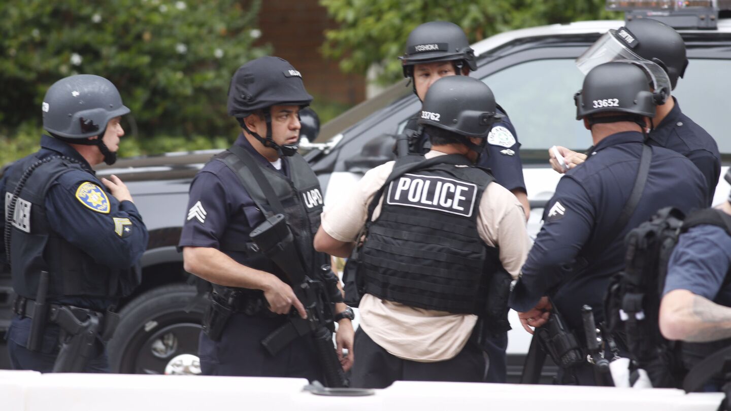 Police officers in tactical gear at the scene of a shooting at UCLA on Wednesday morning.