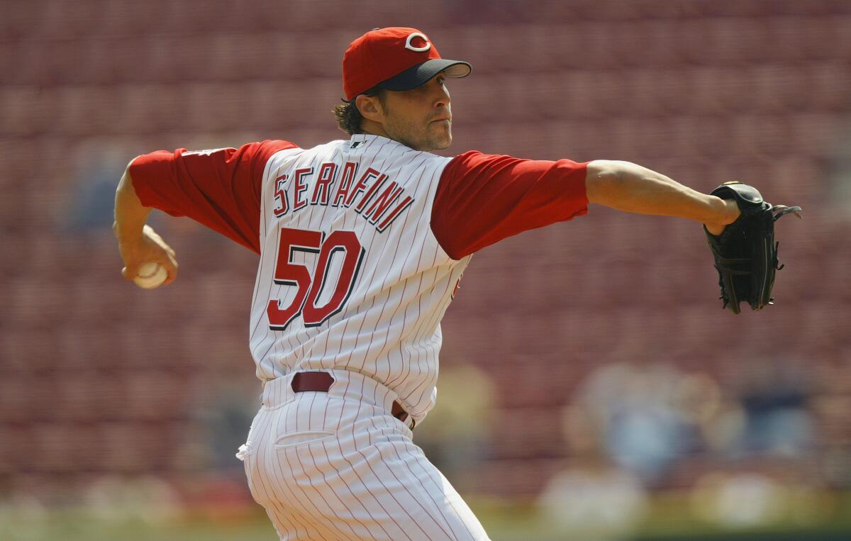 Cincinnati Reds pitcher Danny Serafini throws a pitch during a game.
