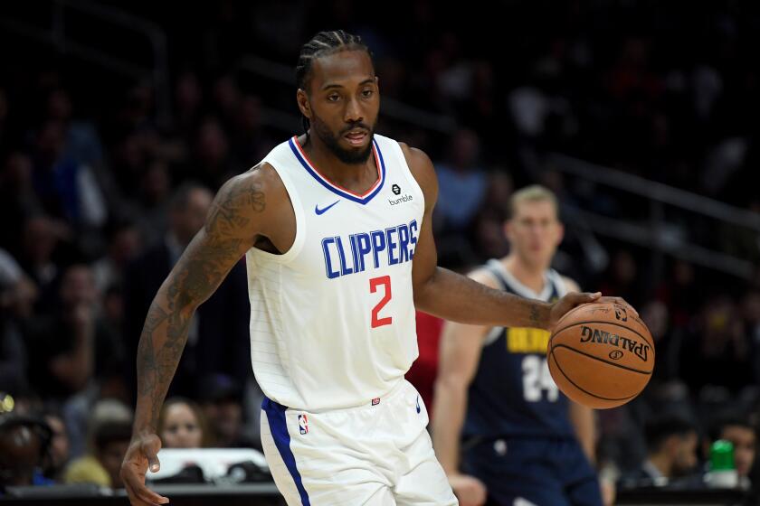 LOS ANGELES, CALIFORNIA - OCTOBER 10: Kawhi Leonard #2 of the LA Clippers dribbles during a 111-91 Denver Nuggets preseason win at Staples Center on October 10, 2019 in Los Angeles, California. (Photo by Harry How/Getty Images)