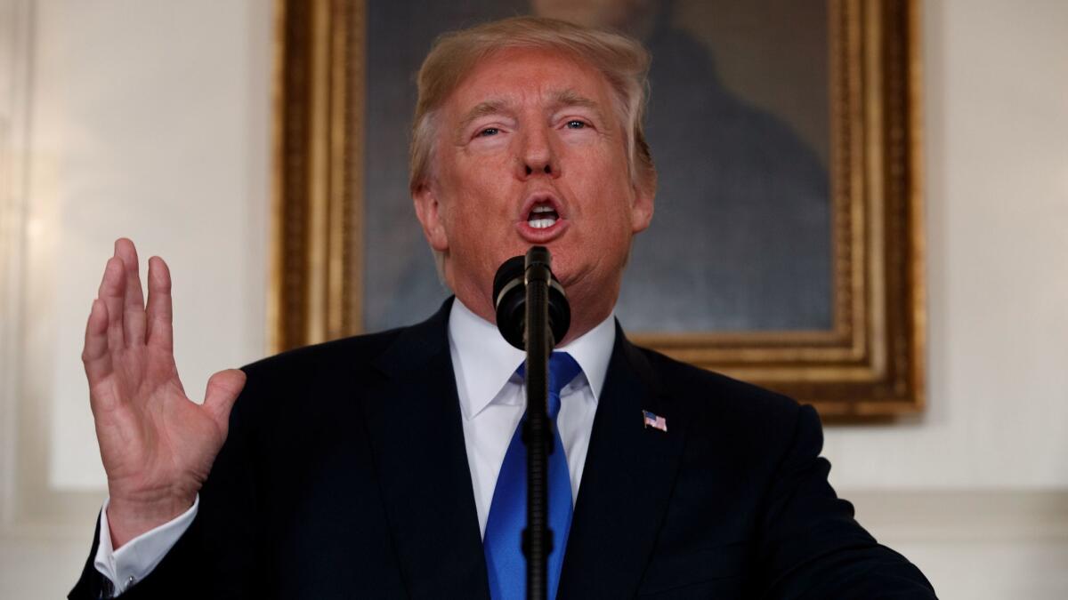 President Trump makes a statement on Iran policy in the Diplomatic Reception Room of the White House in Washington on Oct. 13.