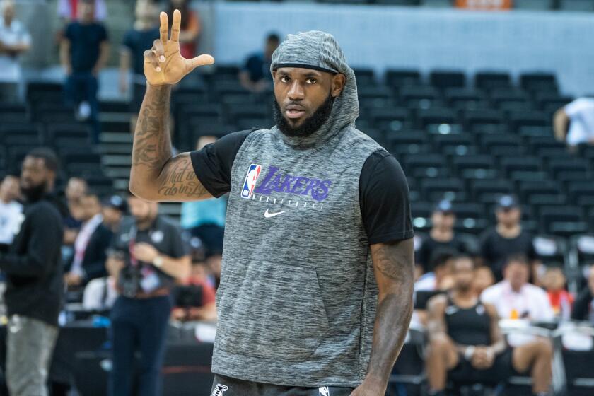 SHENZHEN, CHINA - OCTOBER 12: LeBorn James of Los Angeles Lakers reacts during Los Angeles Lakers v Brooklyn Nets at Shenzhen Universiade Center on October 12, 2019 in Shenzhen, China. NOTE TO USER: User expressly acknowledges and agrees that, by downloading and/or using this photograph, user is consenting to the terms and conditions of the Getty Images License Agreement. (Photo by Ivan Shum - Clicks Images/Getty Images)