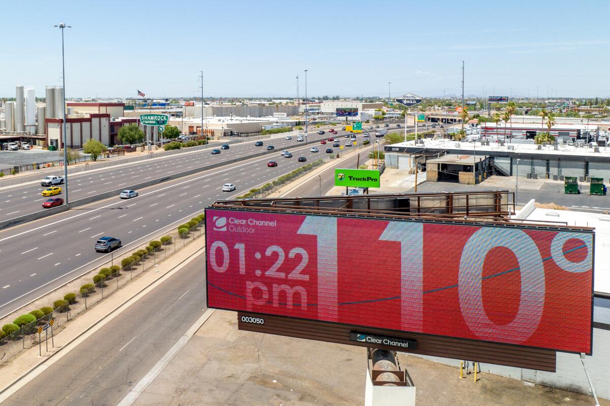 A Phoenix, billboard displays the temperature of 110 degrees Fahrenheit 