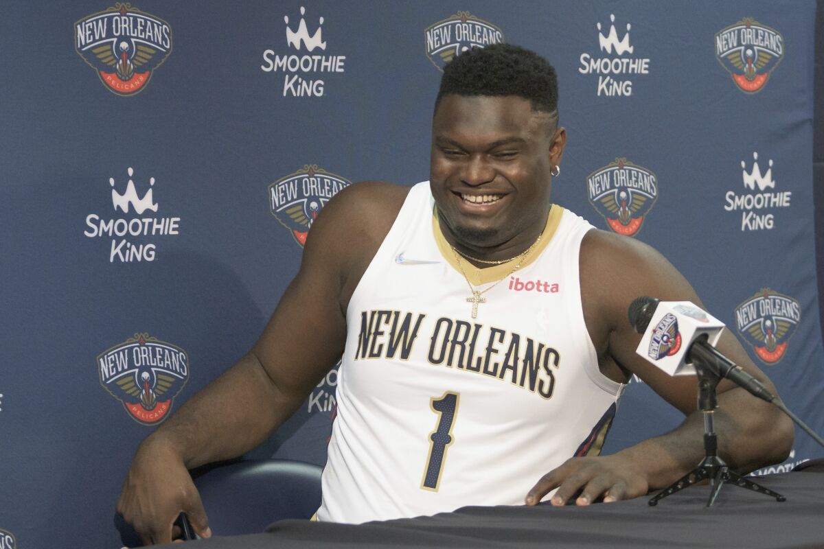 New Orleans Pelicans power forward Zion Williamson smiles during the NBA basketball team's Media Day in New Orleans, Monday, Sept. 27, 2021. (AP Photo/Matthew Hinton)