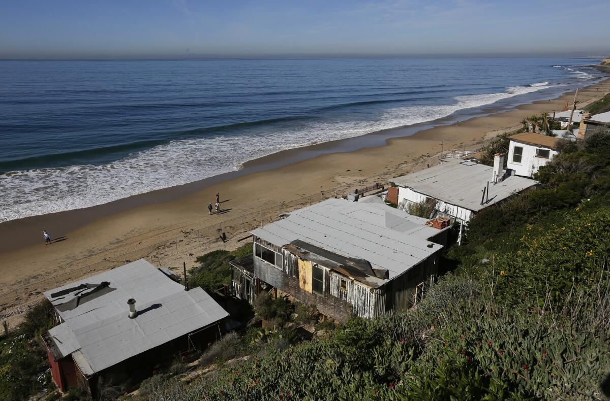 The Coastal Commission approved a plan Wednesday to refurbish the final 17 cottages in Crystal Cove State Park.