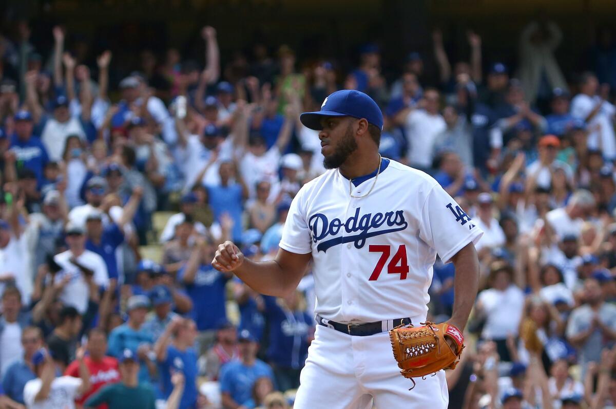 Pitcher Kenley Jansen reacts after striking out Colorado's Wilin Rosario for the last out in 1-0 Dodgers win on May 17 at Dodger Stadium.