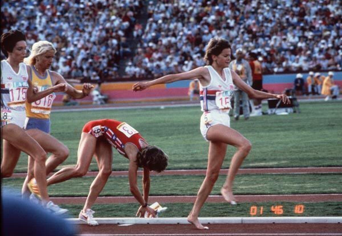 American runner Mary Decker gets tangled up with South Africa’s Zola Budd and falls in the women’s 3,000-meter
