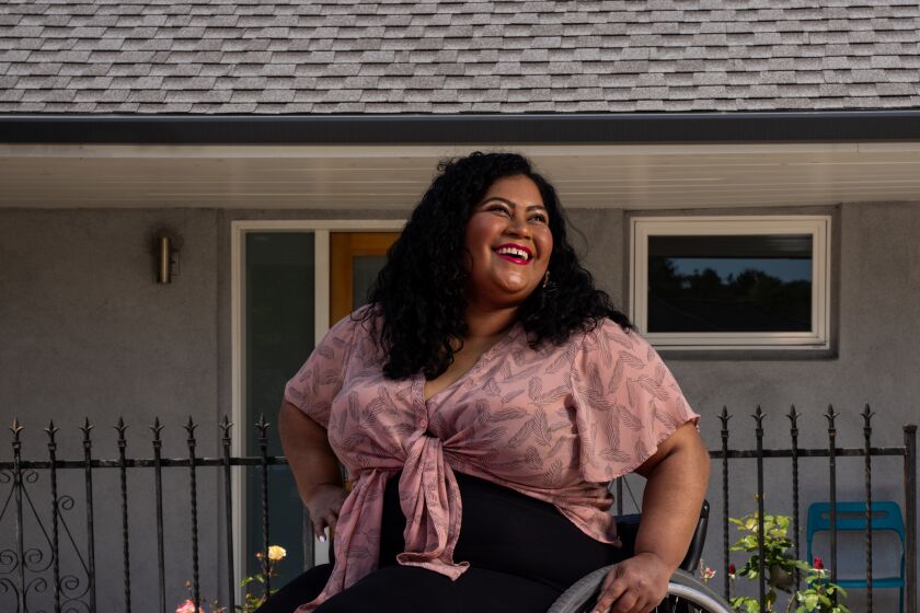LOS ANGELES, CA - APRIL 11: Comedian Danielle Perez poses for a a portrait outside her home in Eagle Rock on Saturday, April 11, 2020 in Los Angeles, CA. Perez, who was a star performer at the recent CBS Diversity Showcase - a platform for diverse artists seeking opportunities for roles on television - was getting a lot of auditions and going out to meetings when her momentum was halted due to the coronavirus pandemic. (Kent Nishimura / Los Angeles Times)