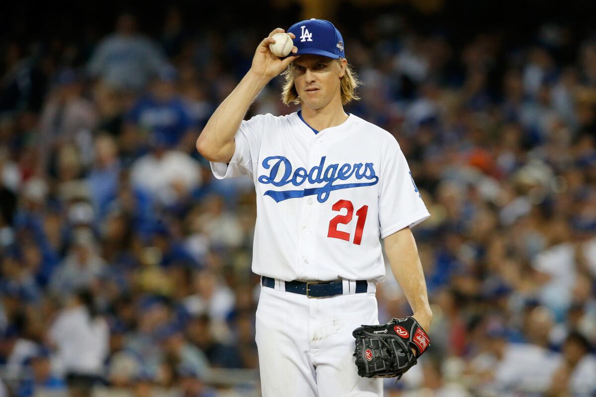 Dodgers pitcher Zack Greinke reacts during Game 5 of the National League Division Series against the New York Mets on Oct. 15 at Dodger Stadium.