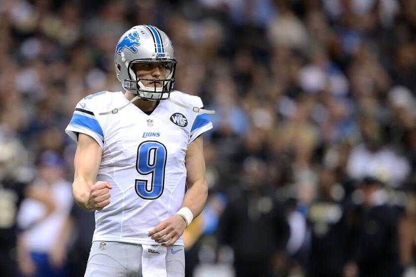 Lions quarterback Matthew Stafford reacts to a touchdown against the Saints during the second quarter.
