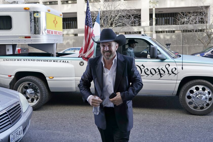 Otero County, New Mexico Commissioner Couy Griffin, arrives at the Federal Court House in Washington, Monday, March. 21, 2022. Griffin is charged with illegally entering Capitol grounds the day a pro-Trump mob disrupted certification of Joe Biden's presidential election victory on Jan. 6, 2021. (AP Photo/Gemunu Amarasinghe)