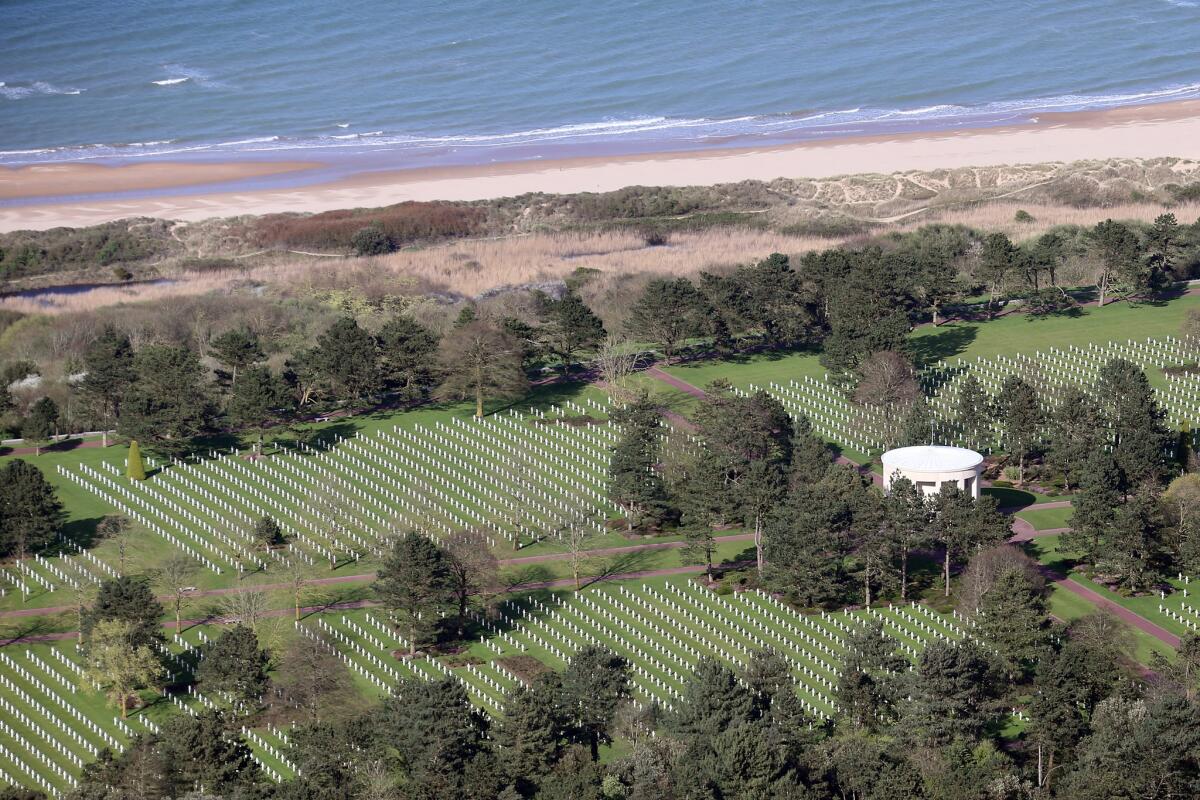 The American War cemetery of Colleville-sur-Mer, France, overlooking Omaha Beach, one of the landing spots during the Normandy invasion. It holds the remains of 9,387 American military dead, most of whom were killed during the invasion and ensuing military operations.