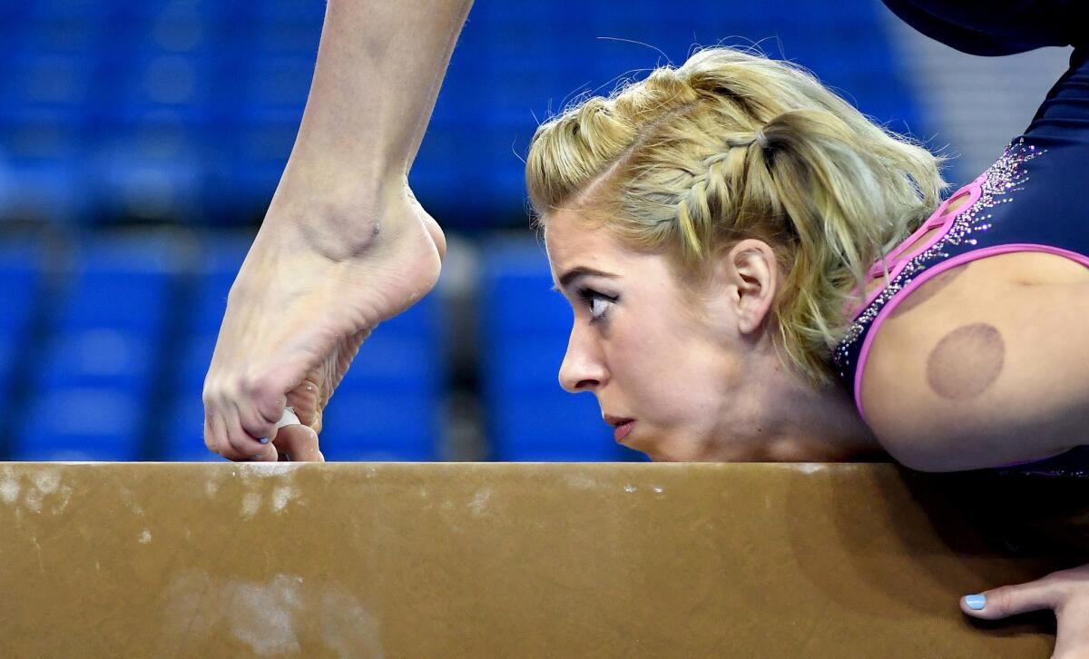 Team member Mercedez Sanchez warms up on the beam during a recent meet at Pauley Pavilion.