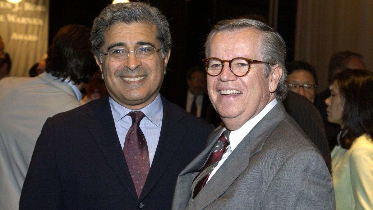 Terry Semel, left, and Bob Daly attend a luncheon honoring Daly in 2004. The pair led Warner Bros. through one of the most stable and profitable periods in its history.