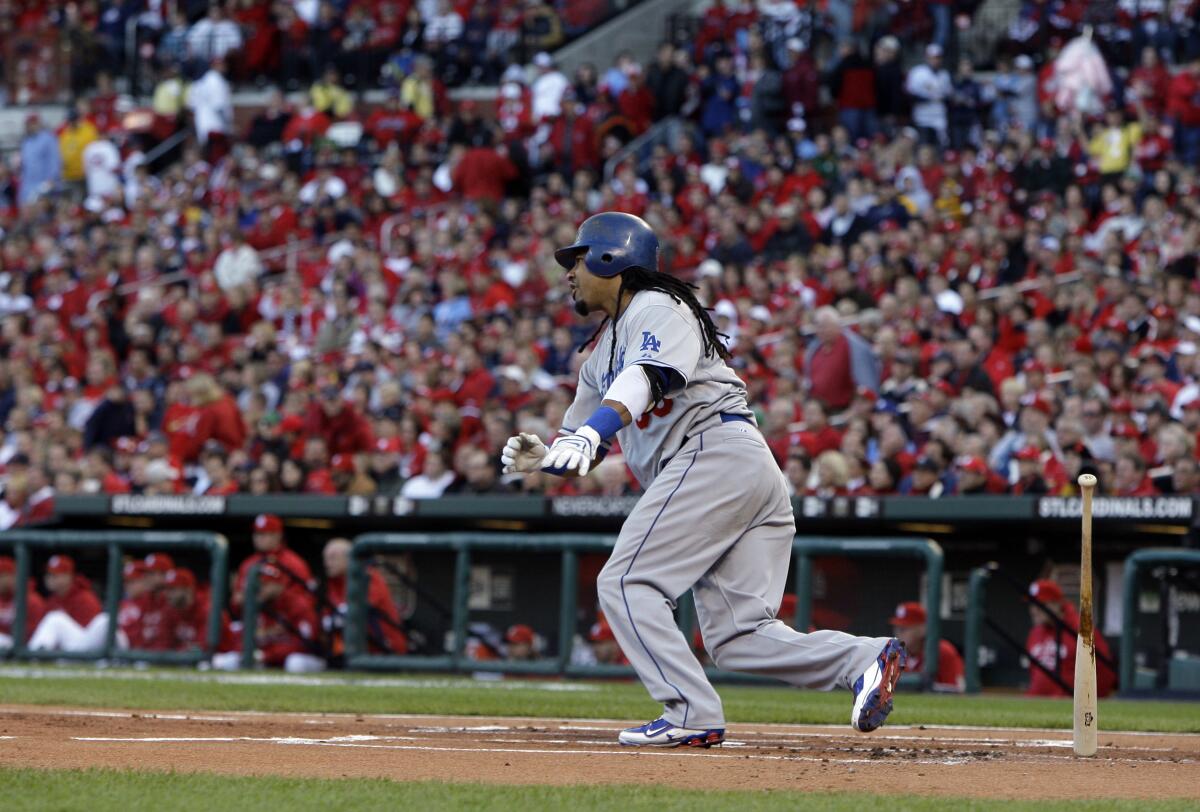 Dodgers left fielder Manny Ramirez runs after getting a hit during Game 3 in the 2009 NLDS.