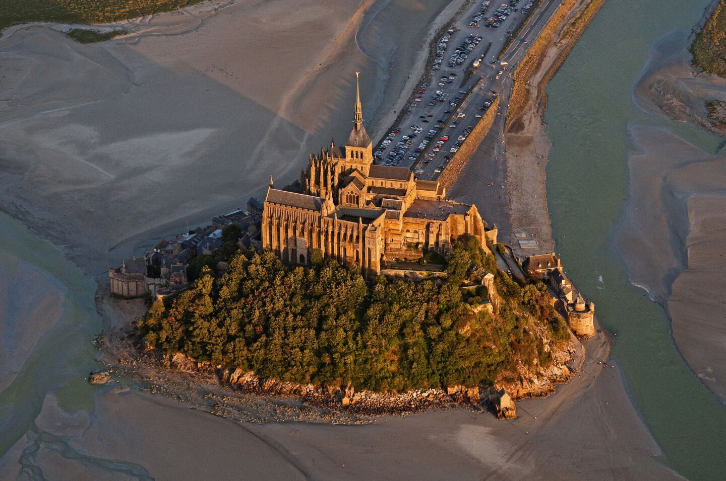 Mont-St.-Michel, with a population of less than 50, ranks as France's third most popular tourist attraction. And years of recent work by French officials should bring water back to the area surrounding the island.