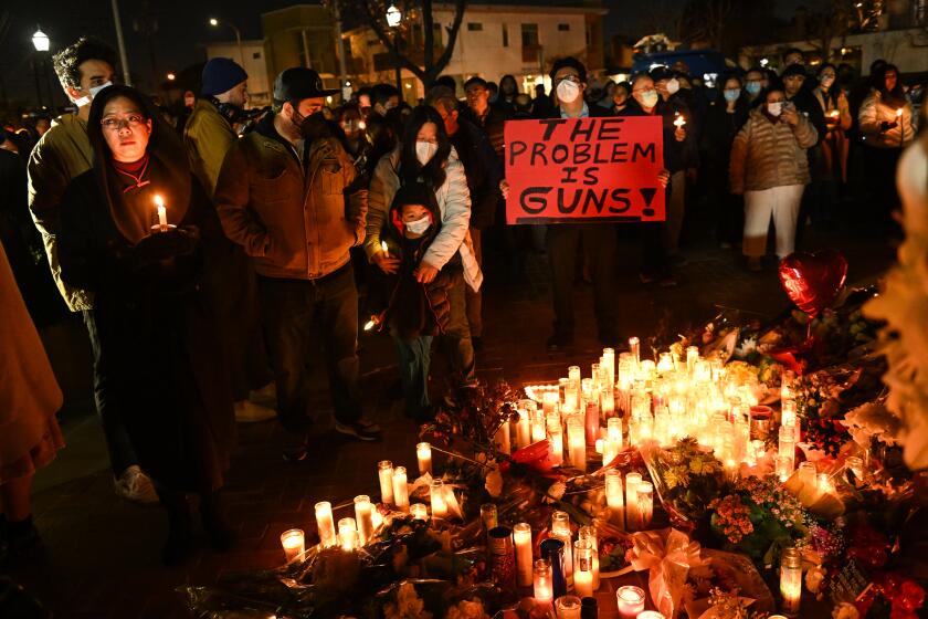 Monterey Park, CA - January 24: Mourners participate in a vigil for the victims of a mass shooting at the Star Dance Studio on Tuesday, Jan. 24, 2023, in Monterey Park, CA.(Wally Skalij / Los Angeles Times)