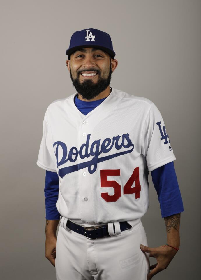 This is a 2017 photo of Sergio Romo. This image reflects the Los Angeles Dodgers active roster as of Friday, Feb. 24, 2017, when the photo was taken in Glendale, Ariz. (AP Photo/Morry Gash)
