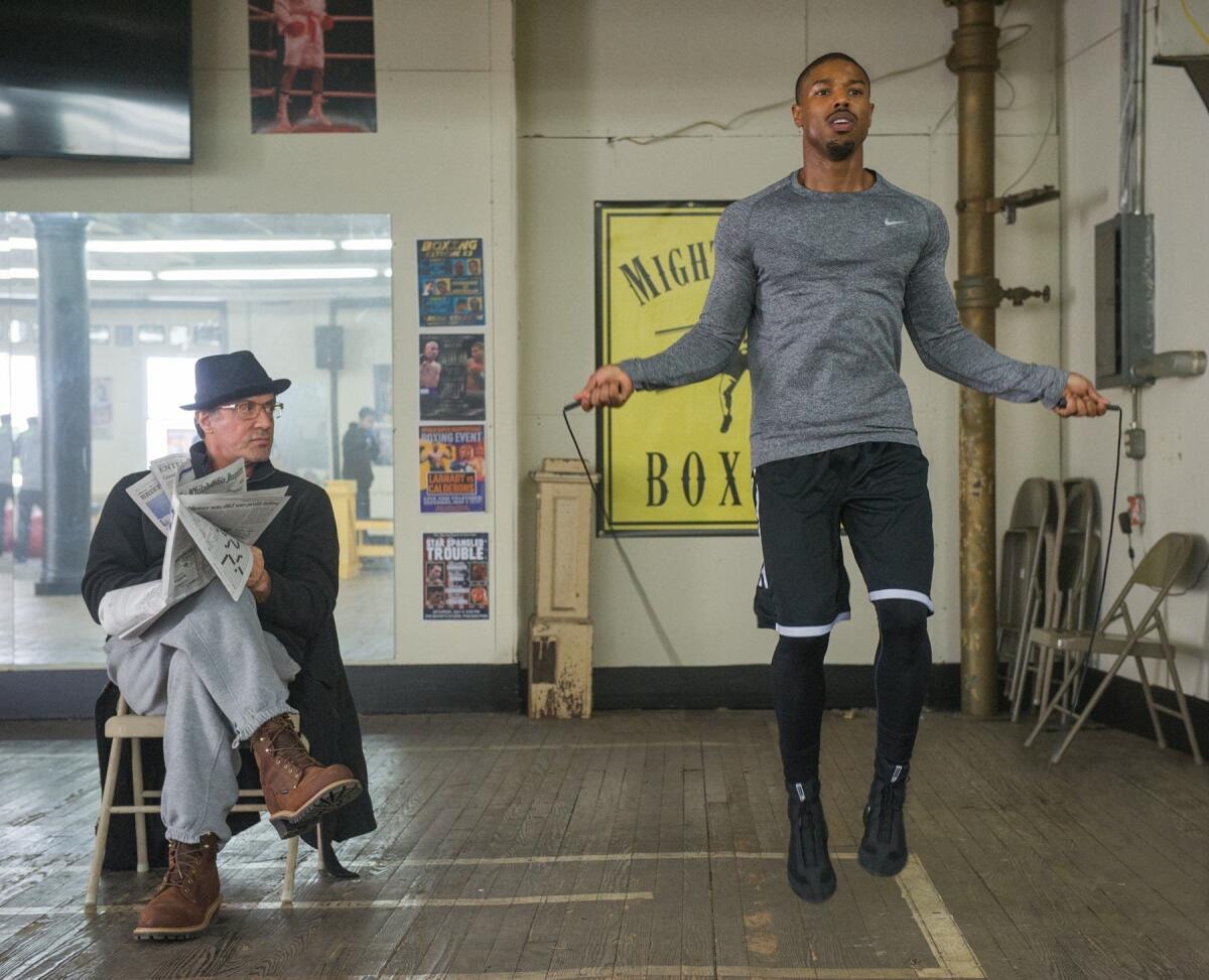 Sylvester Stallone as Rocky Balboa, left, and Michael B. Jordan as Adonis Johnson in "Creed."