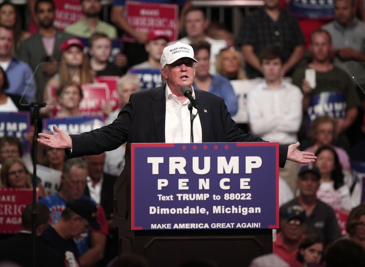 Donald Trump, shown campaigning in Michigan earlier this month, will headline a fundraiser in Illinois in September.