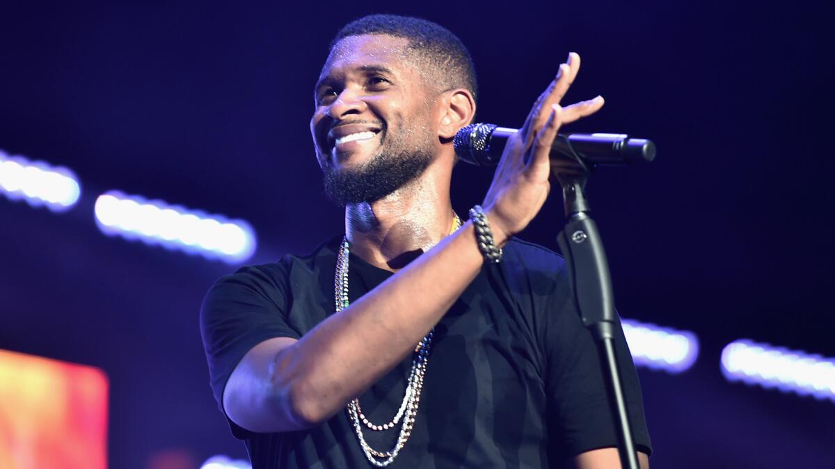 Usher performs Friday night at Staples Center.