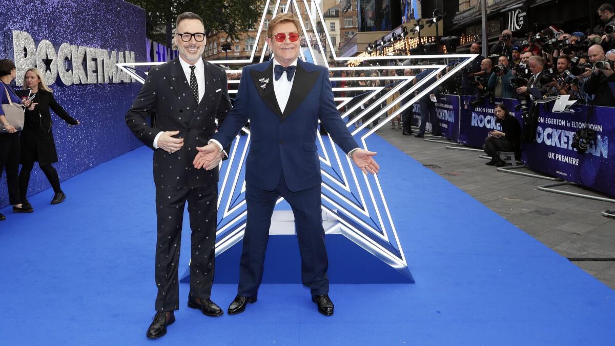 Elton John and his husband, producer David Furnish, arrive for the British premiere of "Rocketman" in London on May 20.