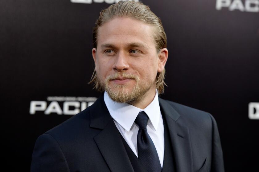 Charlie Hunnam, shown at the "Pacific Rim" premiere in Hollywood in 2013, may play King Arthur in Guy Ritchie's upcoming movie.
