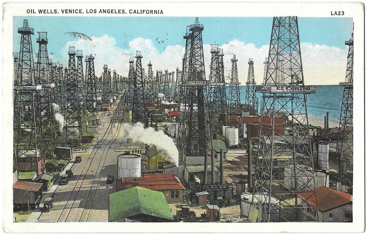 Oil wells dominate the Venice neighborhood of Los Angeles in a vintage postcard.