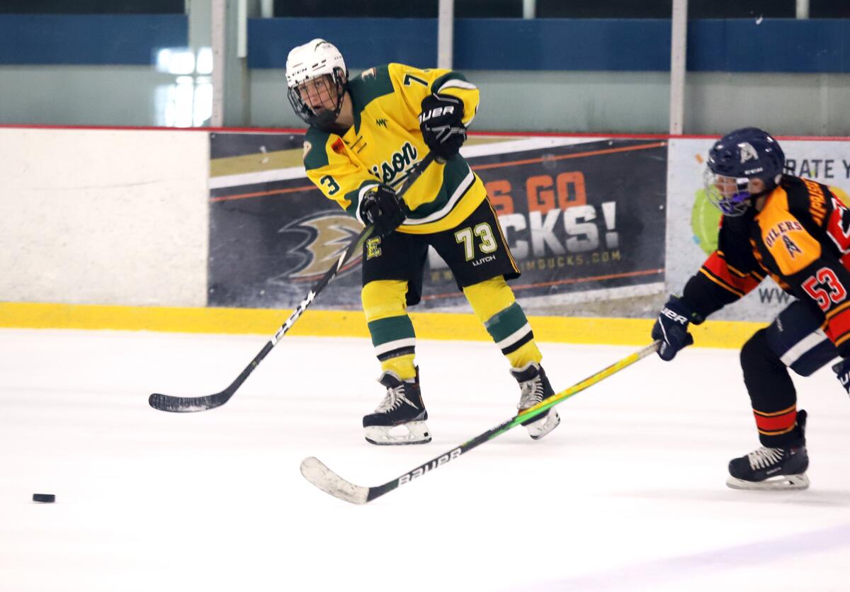 Edison's Charlie Crossett (73) passes the puck in a game against Beach Cities at the Rinks Lakewood Ice on Sept. 24.
