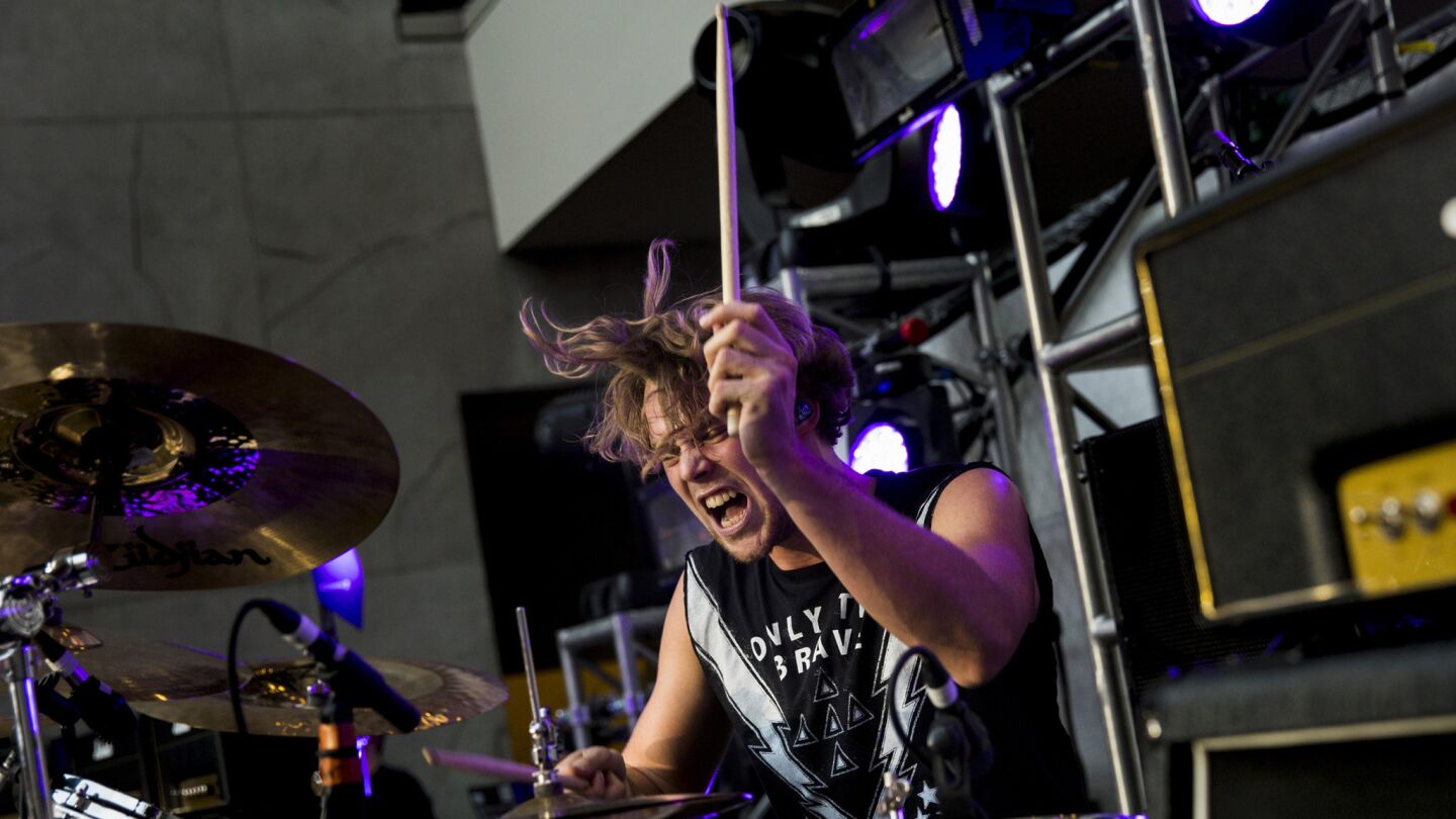 Ashton Irwin of 5 Seconds of Summer performs in Hollywood & Highland Center.