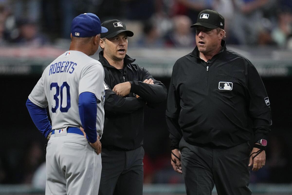 Dodgers-Guardians suspended by rain after 2 innings, set to resume