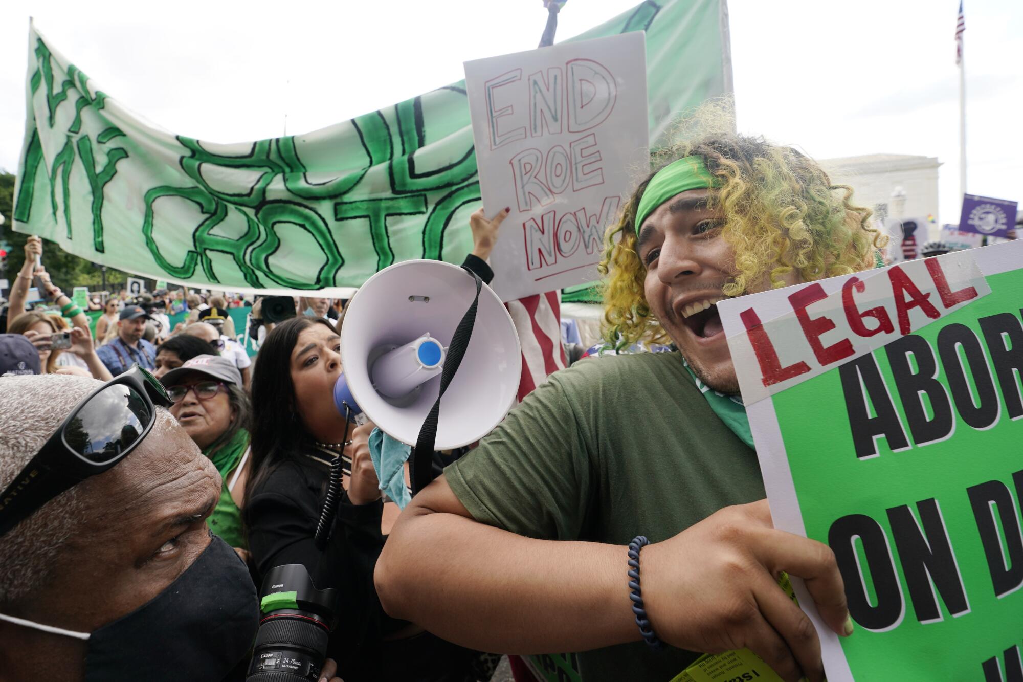 Demonstrators clash outside the Supreme Court on Friday.