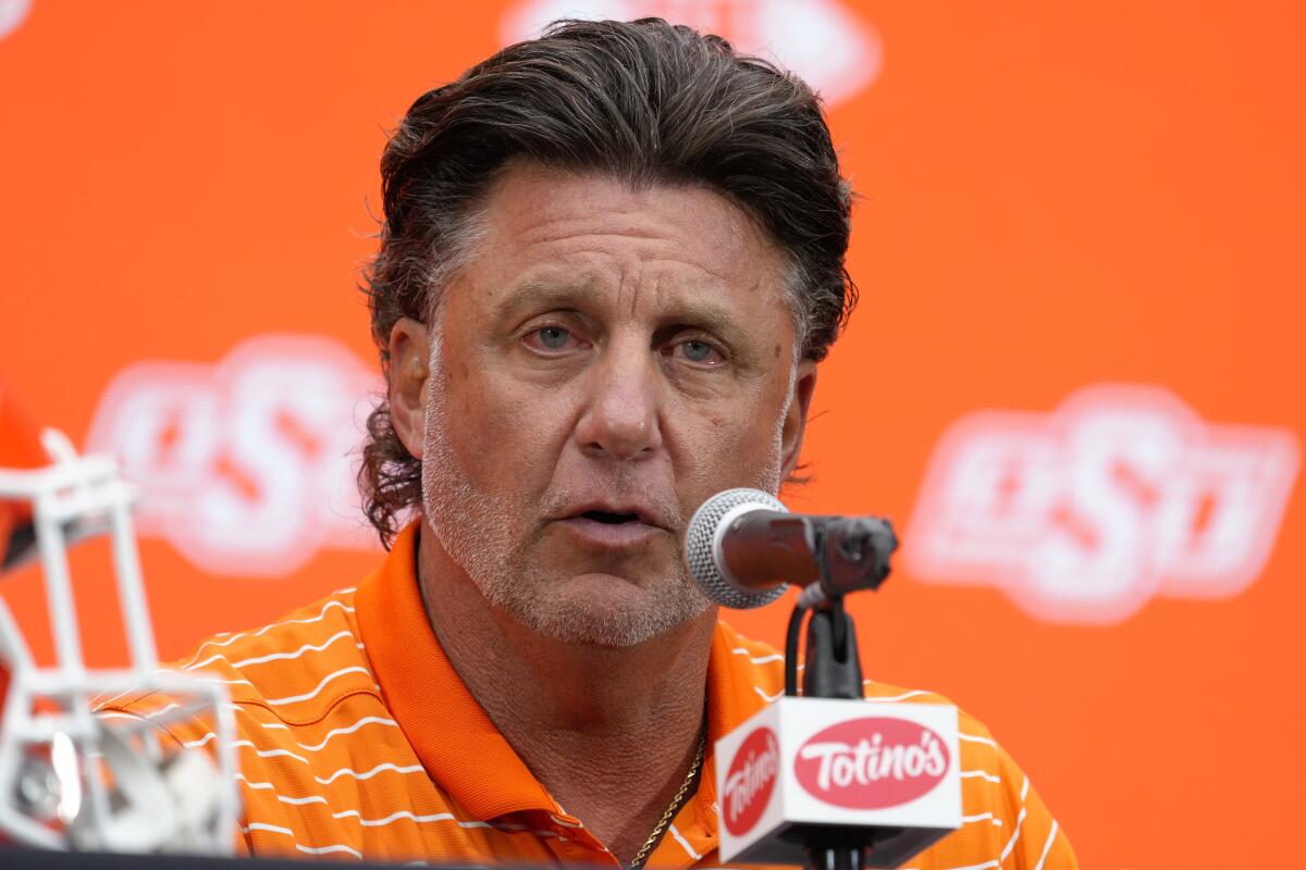 Oklahoma State coach Mike Gundy speaks during Big 12 conference football media day