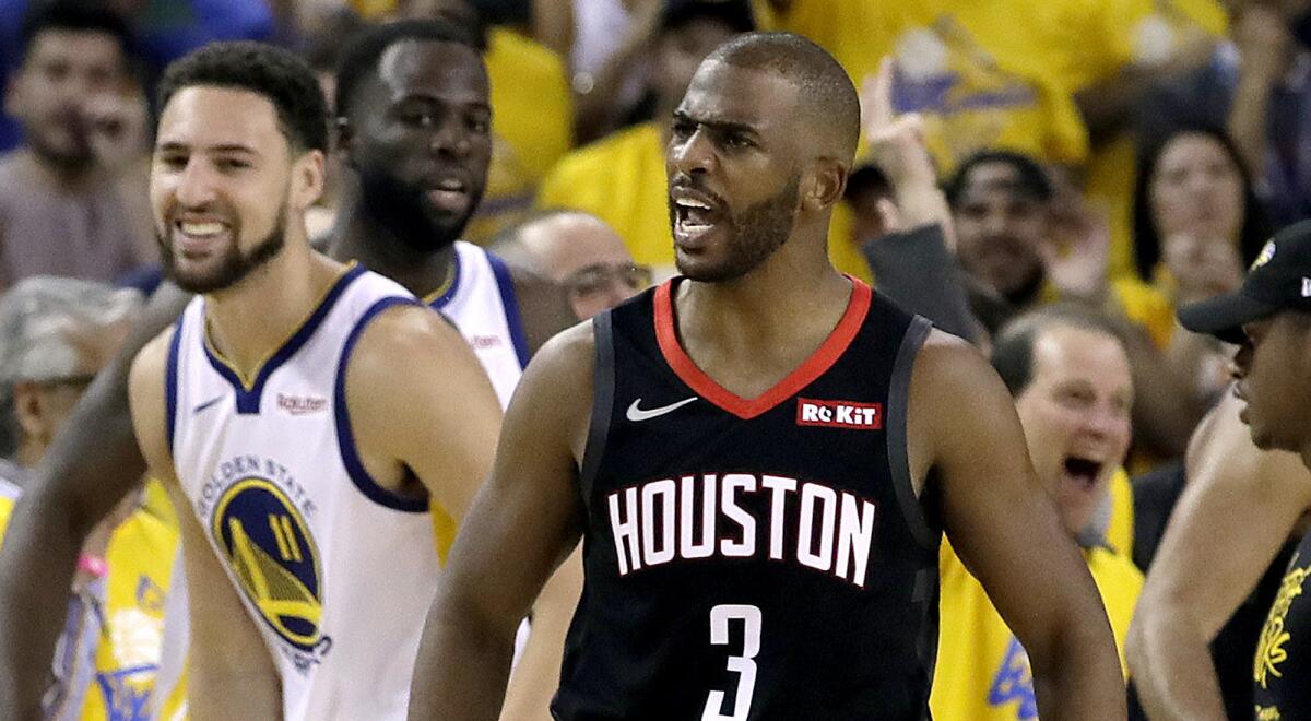 Rockets guard Chris Paul reacts to getting ejected in the final seconds of Game 1 on Sunday in Oakland.