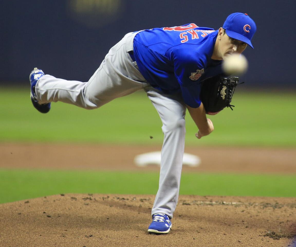 Cubs pitcher Kyle Hendricks delivers to the Milwaukee Brewers during the first inning.