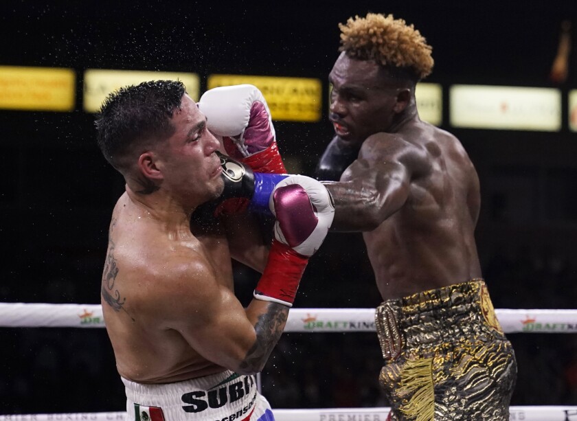 Jermell Charlo, right, lands a shot to Brian Castano during a super welterweight boxing title bout Saturday