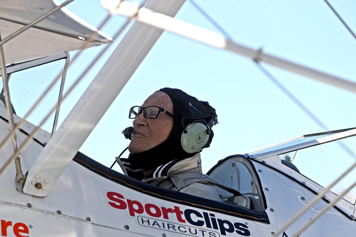 World War II veteran Gordon Reynertson, 96, rode in an open cockpit biplane used to train many pilots during World War II. The flight took place at the Van Nuys Airport in late October. He was one of eight military veterans living at a retirement community in Glendale who were able to take part in the flight experience organized by the nonprofit Ageless Aviation.