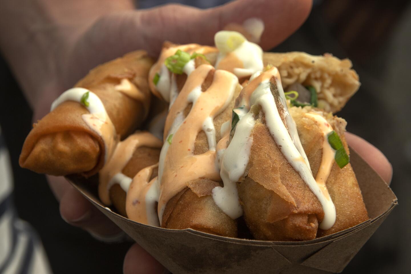 Pork belly ramen lumpias from Lia's Lumpia are offered at the Nood Beach noodle festival Sunday in Huntington Beach. Lumpias are spring rolls common in Indonesia and the Philippines.