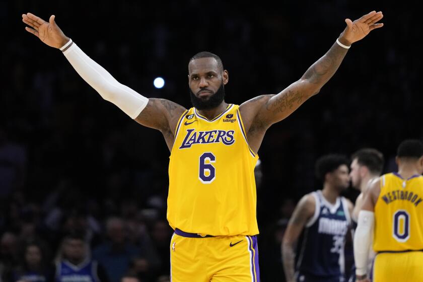 Lakers' LeBron James (6) gestures during the second half of the team's NBA basketball game against the Dallas Mavericks