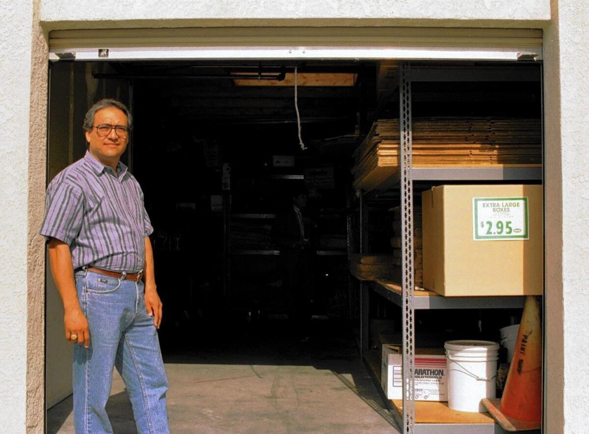 Harry Tosado, manager of the Allsize Storage complex in San Clemente, stands in the doorway to a storage area in 1996 that Famalaro rented and kept a freezer from January 1992 to February 1994.