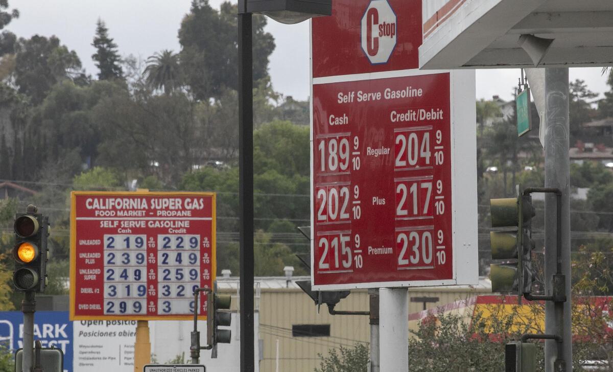 Gas prices at competing stations at the intersection of West 5th and Centre City Parkway in Escondido on Monday, the day oil prices dropped into negative territory.