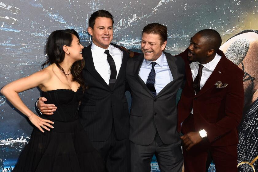 "Jupiter Ascending" stars Mila Kunis, left, Channing Tatum, Sean Bean and David Ajala arrive at the Warner Bros. Pictures film's premiere at the TCL Chinese Theatre on Feb. 2, 2015, in Hollywood.
