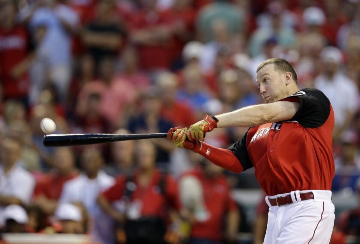 Reds third baseman Todd Frazier connects during the home run derby. Frazier beat Dodgers outfielder Joc Pederson for the title.
