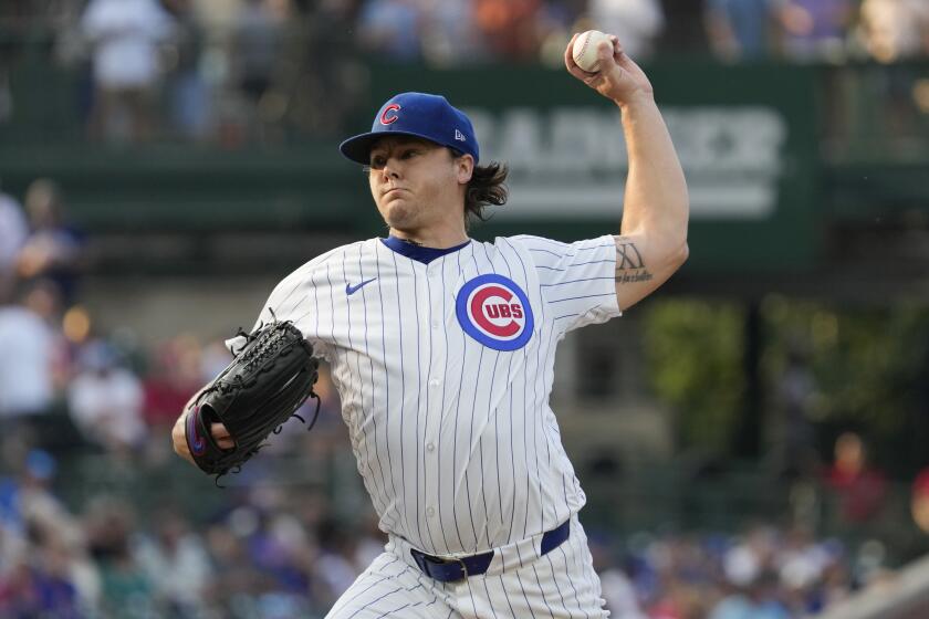 Justin Steele, abridor de los Cachorros de Chicago, lanza frente a los Cardenales de San Luis durante la primera entrada del juego de béisbol del domingo 4 de agosto de 2024, en Chicago. (AP Foto/Nam Y. Huh)