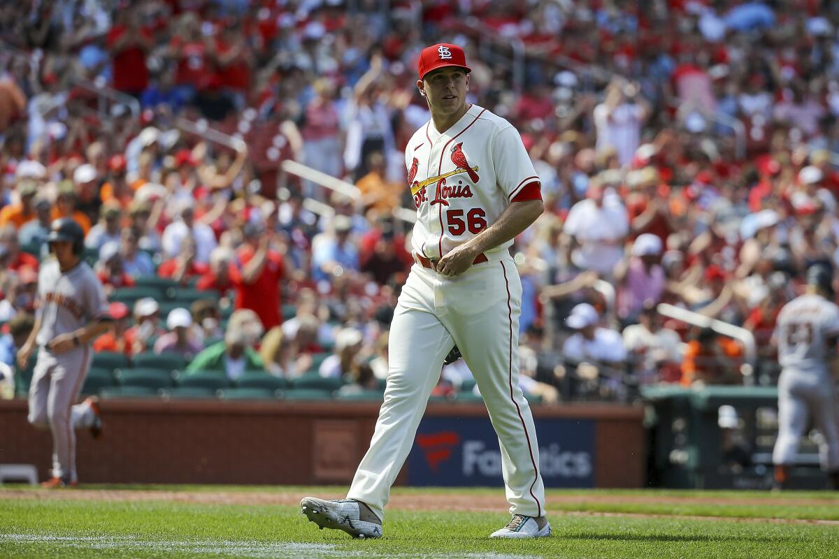 St. Louis Cardinals pitcher Ryan Helsley walks to the dugout after pitching against the San Francisco Giants.