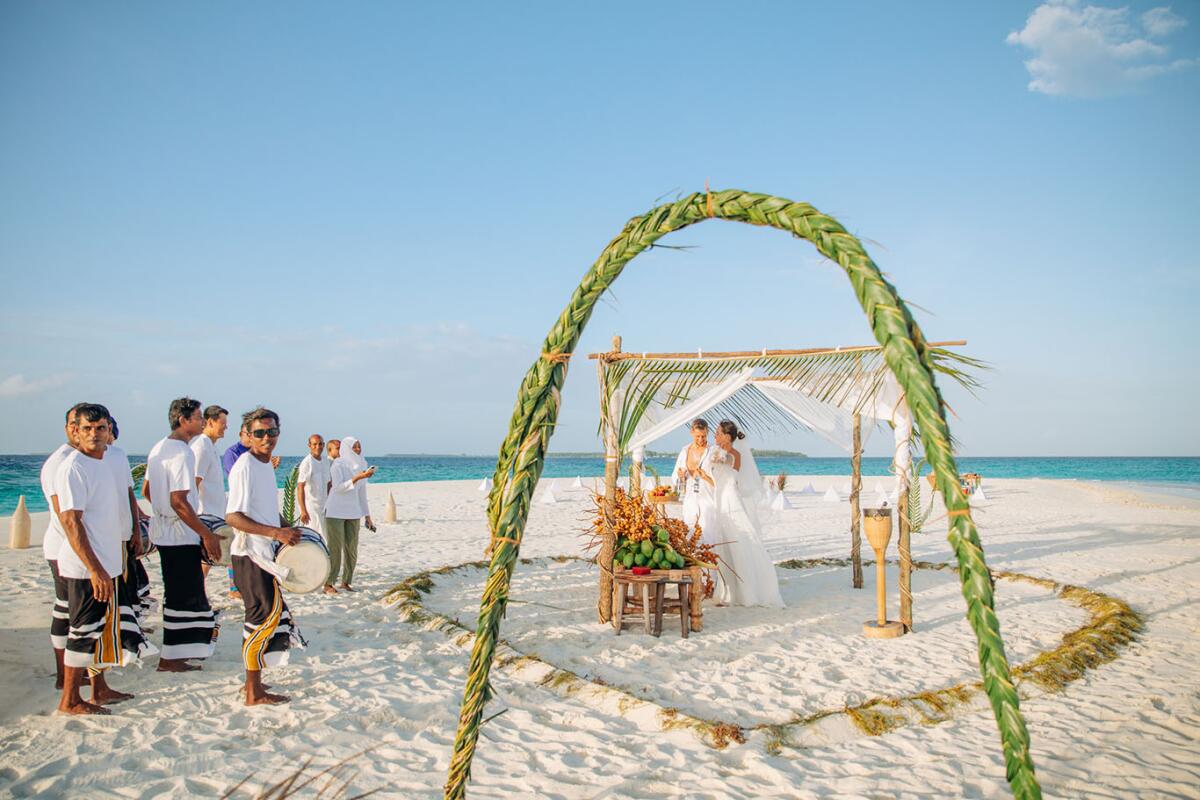 A couple holds an intentional authentic wedding ceremony.