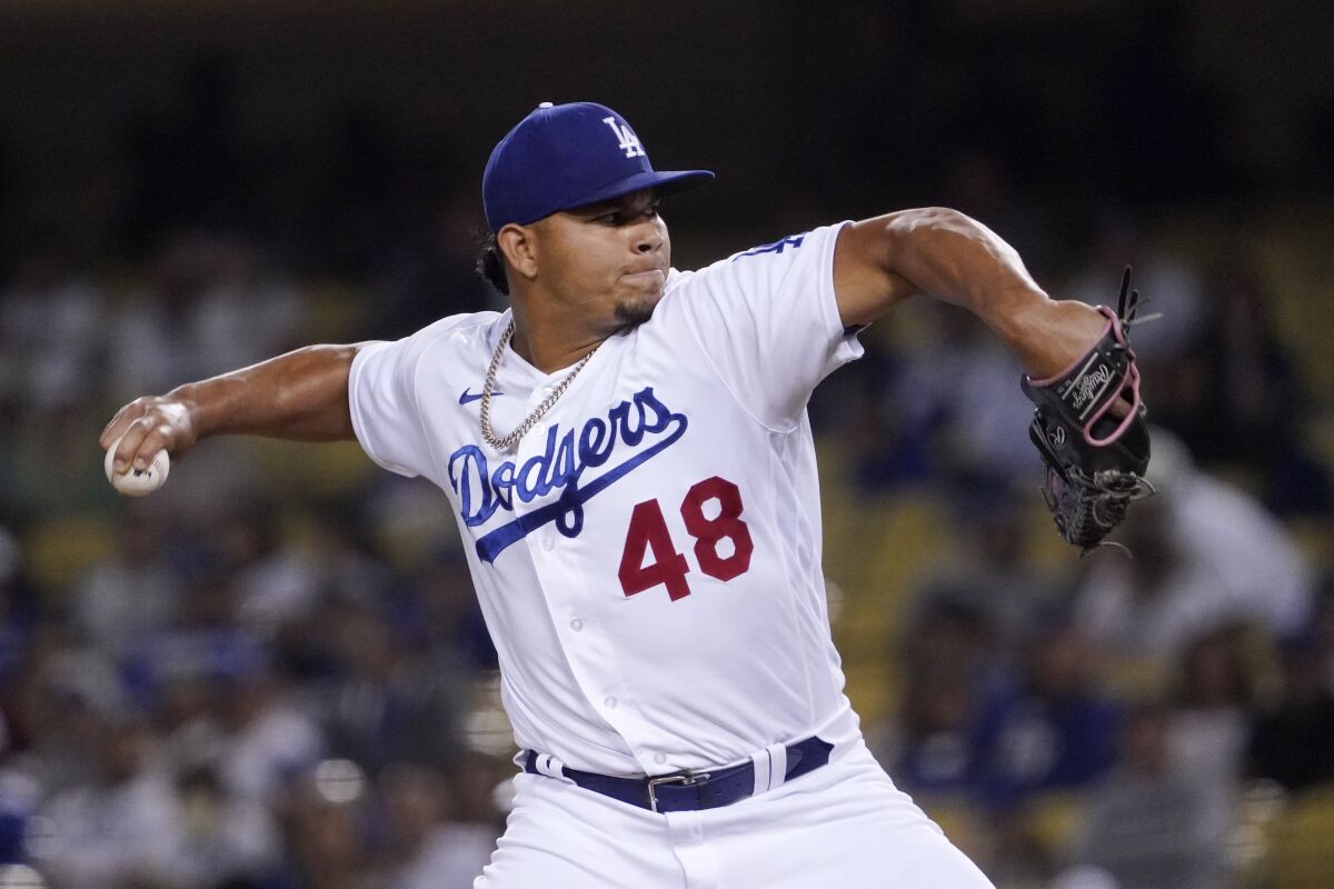 Dodgers relief pitcher Brusdar Graterol throws against the Colorado Rockies on July 5.
