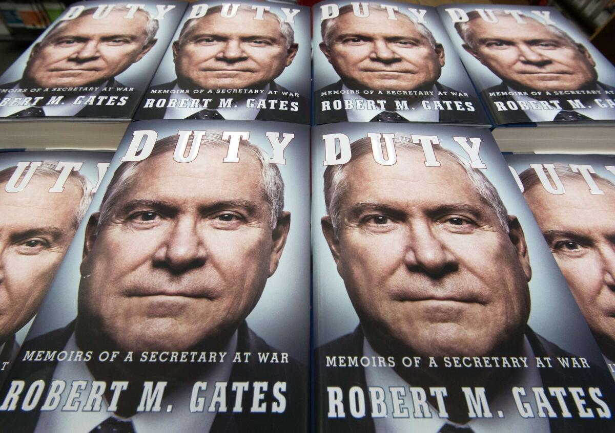 Stacks of former U.S. Defense Secretary Robert Gates' book "Duty, Memoirs Of A Secretary At War" are seen in Fairfax, Va.